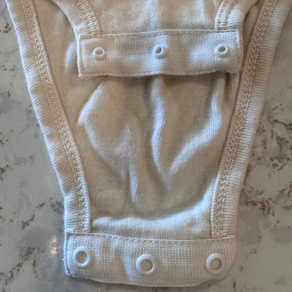 Newborn Cream Baby Onesie with Red Graphic - Austin TX - Picture 2 of 6